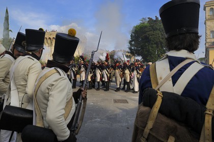 Italy, Liguria, Sarzana, Napoleon Festival, street battles between french soldiers of the Grand Armée and austrian soldiers towards the citadel (fortress Firmafede)