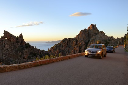 France, Corse du Sud, Golfe de Porto, listed as World Heritage by UNESCO,  the Creeks of Piana (Calanches de Piana) with pink granite rocks and the D81 road between Porto and Cargese