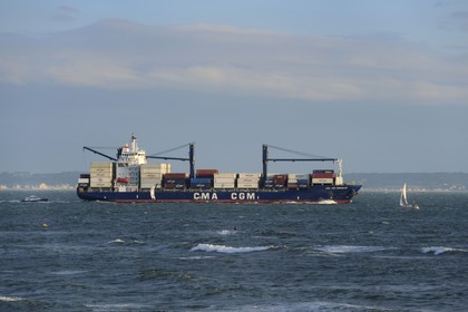 France, Seine Maritime, Le Havre, kitesurfing at the main beach and close to the passage of large container ships
