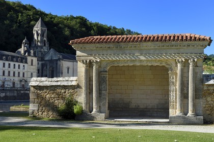 France, Dordogne, Brantome, 16th century resting place in the monks garden and Saint Pierre benedictine abbey in the background