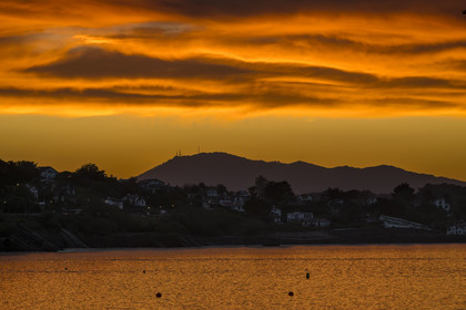 France, Pyrenees Atlantiques, Basque Country, Saint Jean de Luz, the coast of Ciboure in the bay and the Spanish mount Jaizkibel in the background