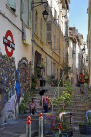 France, Bouches du Rhone, Marseille, Panier district, rue Sainte-Francoise, graffiti from the Undartground concept store surrounded by stairs, work of street Brazilian artist Nhobi