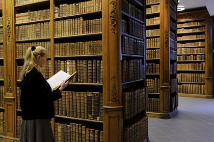 France, Vosges, Epinal, the library Bibliotheque Multimedia Intercommunale (B.M.I) keeps an important collection of early printed books (manuscripts) housed in a wood carved room dated of the 18th century in the heart of a building inaugurated in April 2009