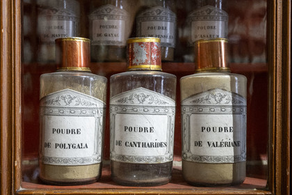 France, Cote d'Or, Beaune, area listed as World Heritage by UNESCO, Hospices de Beaune, Hotel Dieu, glass bottles in the pharmacy or apothecary