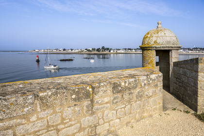 France, Morbihan, Port-Louis, Port Louis Citadel modified by Vauban, at Lorient harbour entrance, watchtower on the ramparts, Larmor-Plage in the background