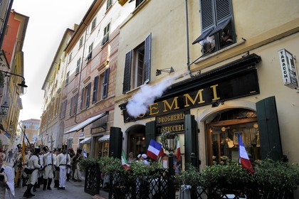 Italy, Liguria, Sarzana, Napoleon Festival, street battles between french soldiers of the Grand Armée and austrian soldiers in the main street Via Mazzini in the old town