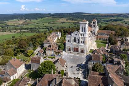 France, Yonne, regional natural park of Morvan, Vézelay, a UNESCO World Heritage site, labelled Les Plus Beaux Villages de France, starting point of one of the main ways to Santiago de Compostela, the hill and the Basilica of Saint Mary Magdalene (aerial view)