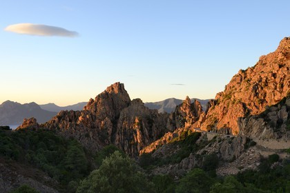 France, Corse du Sud, Golfe de Porto, listed as World Heritage by UNESCO,  the Creeks of Piana (Calanches de Piana) with pink granite rocks and the D81 road between Porto and Cargese