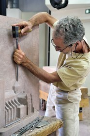 France, Bas Rhin, Strasbourg, old town listed as World Heritage by UNESCO, sculpture and stonemasons' workshops of the Oeuvre Notre-Dame Foundation, Pierre Beaugey, tailleur de pierre et responsable de l'atelier de taille, travaille sur une réduction de la cathédrale pour être un plan pour les non-voyants