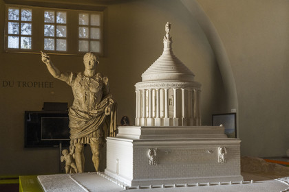 France, Alpes-Maritimes, La Turbie, Trophée d'Auguste or Trophée des Alpes, Roman monument built in the year 6 BC, reconstruction of the monument and statue of Augustus of Prima Porta in the background
