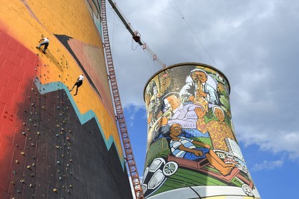 South Africa, Gauteng Province, Johannesburg, Orlando Towers overlooking the Orlando area of ​​Soweto, climbing wall of the Vertical Adventure Centre on one of the two cooling towers from the Orlando Power Station