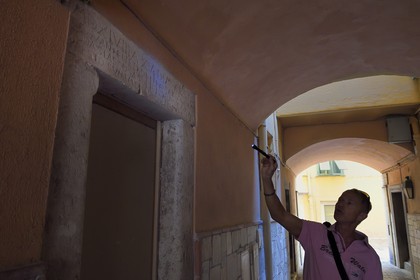 Principality of Monaco, Monaco, the old town on the Rock, passage de la Miséricorde, stone lintel (1548) which is all that remains of the Spanish protectorate