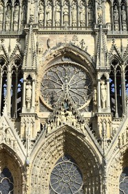 France, Marne, Reims, Notre-Dame de Reims cathedral, listed as World Heritage by UNESCO, the western facade, Baptism of Clovis (center) by the Bishop Saint Remi and the large rose window