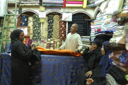 Egypt, Upper Egypt, Nile Valley, Luxor, the new souk, fabrics merchant