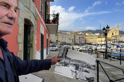 France, Haute Corse, Bastia, the harbour overlooked by St Jean Baptiste Church and photograph of the quai Albert Gillio a century ago