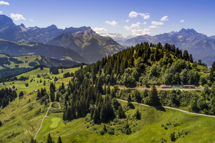 Switzerland, Canton of Vaud, Villars-sur-Ollon, train to the Bretaye pass station at the Bouquetins station and Mont-Blanc in the background (aerial view)