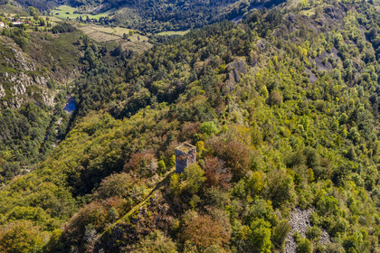 France, Haute Loire, Loire river Valley, Lafarre, the 11th century Tour de Mariac ruins of the Chateau de Lafarre on a volcanic hillock overlooking the gorges of the Loire on the left and its tributary La Langougniole on the right (aerial view)