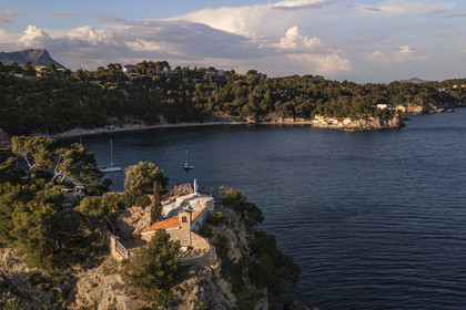 France, Var, the Rade (Roadstead) of Toulon, Cap Brun, the chapel of Notre Dame du Cap Falcon which overlooking the harbor of the small houses of Mejean cove (aerial view)