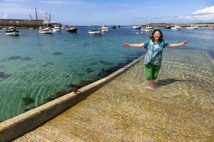 France, Finistère, Iroise Sea, Molene Island, Christine Demeure who manages the only grocery store on the island at the port
