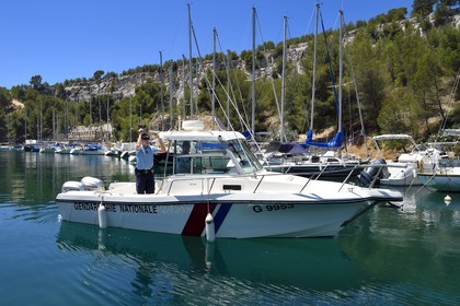 France, Bouches du Rhone, Cassis, National Park of the Calanques, Calanque de Port Miou (cove), boat patrol of the national gendarmerie in the marina (request for authorization necessary before publication)