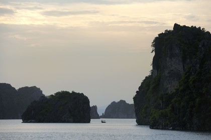 Vietnam, Quang Ninh Province, Halong Bay, listed as World Heritage by UNESCO, fishing boat