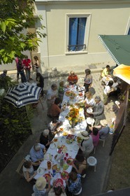 France, Paris, Menilmontant District, neighbour celebration in Passage des Soupirs