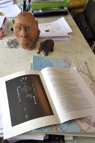 France, Paris, supposed reproduction of Lucy's face and publication describing her discovery at the office of the paleontologist and paleoanthropologist Yves Coppens parisian home