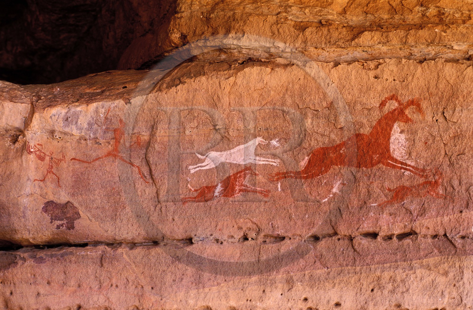Libye, région du désert, Le Fezzan (Sahara), Tadrart Akakus, peinture rupestre, scène de chasse au mouflon (8000 ans)