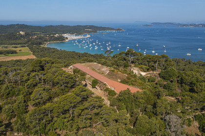 France, Var, Iles d'Hyeres, Parc National de Port Cros (National park of Port Cros), Porquerolles island, Orthodox Monastery of Santa Maria in the former Fort of Repentance, the Sainte-Agathe castle overlooking the port in the background (aerial view)