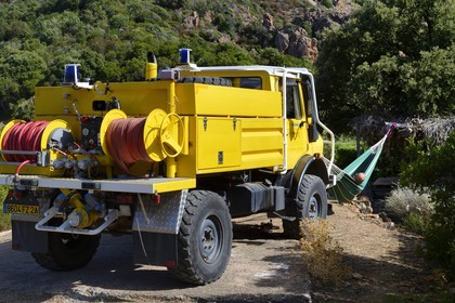 France, Corse du Sud, Golfe de Porto, listed as World Heritage by UNESCO, firefighters truck and nap in a hammock