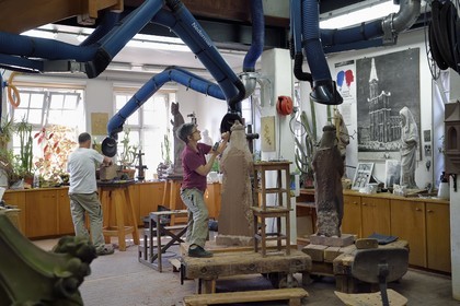 France, Bas Rhin, Strasbourg, old town listed as World Heritage by UNESCO, sculpture and stonemasons' workshops of the Oeuvre Notre-Dame Foundation, the sculptor Nathalie Masson making a copy of a statue of St. Richarde