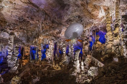 France, Gard, Mejannes-le-Clap, grotte de La Salamandre (Salamander cave), discovery of the cave in Aéroplume®, an individual dirigible balloon inflated with helium which allows you to fly away by flapping your wings