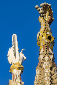 Spain, Catalonia, Barcelona, Eixample district, Sagrada Familia basilica by Catalan modernist architect Antoni Gaudi, listed as a UNESCO World Heritage Site, Venetian mosaic pinnacle of the Towers of the Apostles, one of the four 135-metre bell towers surrounding the central ciborium whose pinnacle is crowned by the winged bull, symbol of Saint Luke