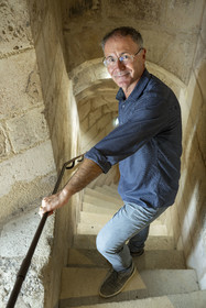 France, Charente Maritime, La Rochelle, the Old Port, local writer and historian Mickael Augeron in the Saint-Nicolas Tower that protects the entrance to the Old Port