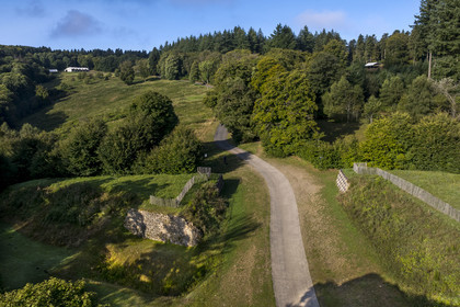 France, Saone et Loire, regional natural park of Morvan, Saint Leger sous Beuvray, Bibracte on Mont Beuvray, a Gaulish oppidum capital of the Aedui and one of the most important hillforts in Gaul, the fortified entrance to the site on the former rampart (aerial view)