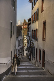 Switzerland, Basel, Old town of Greater Basel (left bank), alley and staircase of Imbergasslein arriving in Nadelberg street, the Rathaus in the background