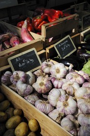 France, Herault, Montpellier, Market of Arches under the Aqueduct St. Clement, fruit and vegetable stall, garlic