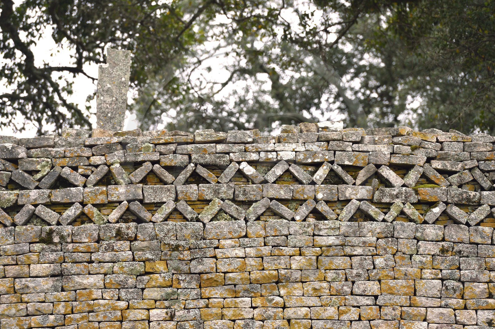Zimbabwe, Masvingo province, the ruins of the archaeological site of Great Zimbabwe, UNESCO World Heritage List, 10th-15th century, stone frieze decorating the exterior wall summit of the Great Enclosure