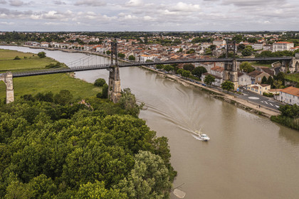 France, Charente-Maritime, Saintonge, Tonnay Charente, the suspension bridge built in 1842 over the Charente river (aerial view)