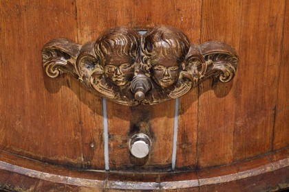 France, Bas Rhin, the Alsace Wine Route, Mittelbergheim, labelized the Most Beautiful Villages of France, 16th century underground cellars of the Wine estate GILG, centenary large barrel