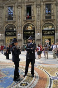 Italy, Lombardy, Milan, Vittorio Emmanuel II Gallery, shopping arcade built on the 19th century by Giuseppe Mengoni, police officers