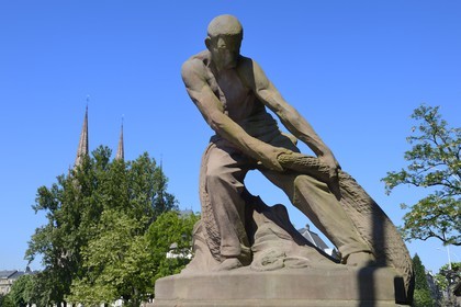 France, Bas Rhin, Strasbourg, Neustadt district dating from the german period, the Kennedy bridge also called four giants bridge, fisherman with his net