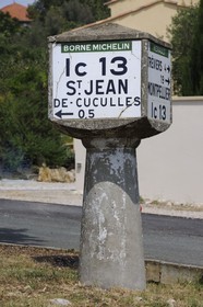 France, Herault, road sign boundary stone Michelin
