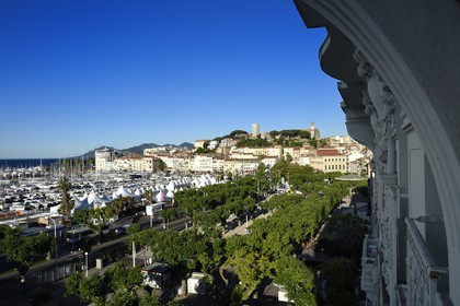 France, Alpes-Maritimes, the old town in Le Suquet district overlooking the port, at its peak the Tour du Suquet and the steeple of the Notre-Dame-de-l'Esperance church