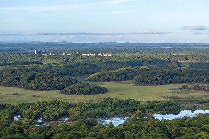 France, French Guiana, Kourou, wetlands, forests and savannas protected within the space centre and managed by the National Forestry Office (ONF) that can be seen in the distance (aerial view)