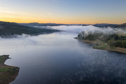 France, Nievre, Regional Natural Park of Morvan, Chaumard, Pannecière lake in the early morning mist (aerial view)
