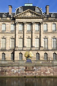 France, Bas Rhin, Strasbourg, Rohans Palace at the Ill River banks, It now houses three museums, the Museum of Decorative Arts, the Museum of Fine Arts and the Archaeological Museum, and Street Heart, traveling exhibition of 10 giant carvings of Alsatian headdresses scattered throughout the city