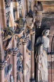 France, Bas Rhin, Strasbourg, old town listed as World Heritage by UNESCO, Notre Dame Cathedral, the western facade, the gallery of the apostles, deformed and chimerical beings on the columns between the apostles