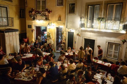 Portugal, Lisbon, Alfama district, lively terrace restaurant on the square Largo de Sao Rafael at night