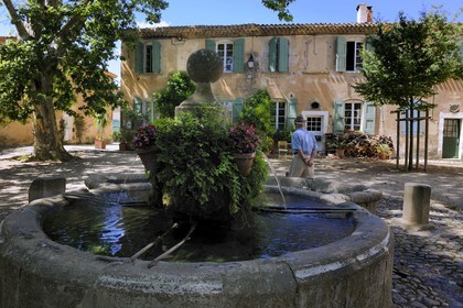 France, Herault, Villeneuvette, former Royal factory, the fountain on the place Louis XIV set up for the washerwomen